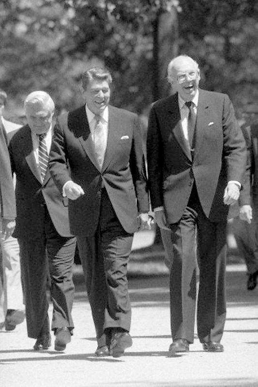 U.S. President Ronald Reagan with his Director of Central Intelligence, William Casey, on May 1, 1984. The DCIs were considered the most important presidential foreign-policy advisor from 1946 to 2004 (the office was replaced by the DNI, Director of National Intelligence, in 2004). Casey, moreover, was one of several intelligence chiefs who actively influenced U.S. foreign policy. His name is linked to the arming of the mujahideen by the CIA during the Soviet war in Afghanistan as well as with supporting the Contras in the 1980s, a right-wing rebel organization in Nicaragua. Casey also rejected the newly expanded Congressional controls on U.S. secret services and refused to cooperate with the respective Senate and Congressional committees. Photo: Levan Ramishvili, source: [https://www.flickr.com/photos/levanrami/15013487576/in/album-72157627135259253/ Flickr], public domain