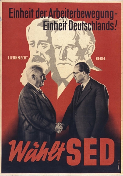 Farbiges Plakat mit zwei Männern, die sich die Hände reichen