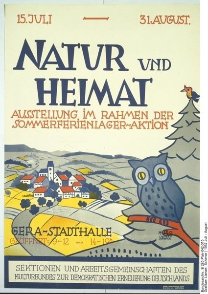A small village in the midst of a slightly hilly, agricultural landscape with small-scale farms. The owl and pine tree suggest a forest. There is no room for modernity in this picture – even in 1952 the iconographic models of the Heimatschutz movement from the imperial era are invoked in the GDR.
<br />
Exhibition poster: “Nature and Homeland,” Gera 1952, exhibition in the context of a summer-camp drive of the Kulturbund. Artists: Lienert and Schirner, Printed by: Gerth & Oppenrieder, Gera. Source: Bundesarchiv B 285 Plak-042-015 courtesy of the German Federal Archives